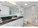 Clean, bright bathroom with white cabinetry, dark granite counters, and shower/tub combo at 2801 S Ocean Blvd. # 1237, North Myrtle Beach, SC 29582