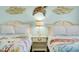 Twin beds in a bright, ocean-themed bedroom at 2801 S Ocean Blvd. # 1237, North Myrtle Beach, SC 29582