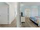 View from the hallway into the bedroom, showcasing the layout and bathroom at 2801 S Ocean Blvd. # 1237, North Myrtle Beach, SC 29582
