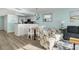 Open-concept living and dining area with a breakfast bar and coastal decor at 2801 S Ocean Blvd. # 1237, North Myrtle Beach, SC 29582