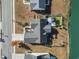 Aerial view of the home's roof, backyard, and proximity to a pond at 3419 Merganser Dr., Conway, SC 29527