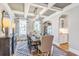 Elegant dining room with coffered ceiling, hardwood floors, and built-in cabinetry at 348 Happy Valley Dr., Myrtle Beach, SC 29588