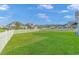 Spacious backyard with lush lawn and white picket fence at 360 Hillsborough Dr., Conway, SC 29526