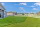 Large backyard with green grass and a white fence at 360 Hillsborough Dr., Conway, SC 29526
