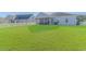 Expansive grassy backyard, partially shaded, with white fence at 360 Hillsborough Dr., Conway, SC 29526