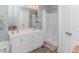 Bathroom with double vanity, shower, and tile floor at 360 Hillsborough Dr., Conway, SC 29526