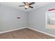 Bright bedroom with hardwood floors and ceiling fan at 360 Hillsborough Dr., Conway, SC 29526