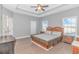 Spacious Primary bedroom with ceiling fan and wood flooring at 360 Hillsborough Dr., Conway, SC 29526