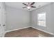 Spacious bedroom with hardwood floors and ceiling fan at 360 Hillsborough Dr., Conway, SC 29526