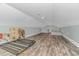 Spacious bonus room with wood flooring and large windows at 360 Hillsborough Dr., Conway, SC 29526