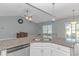 Kitchen with granite island, double sink, and stainless steel dishwasher at 360 Hillsborough Dr., Conway, SC 29526