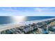 Aerial view of beach house near the glistening ocean and pier at 411A Ocean Blvd. S, Surfside Beach, SC 29575