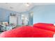 Fourth bedroom with two twin beds, sitting area, and ensuite bathroom access at 411A Ocean Blvd. S, Surfside Beach, SC 29575