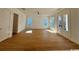 Sunlit living room with hardwood floors and French doors at 493 Ayrhill Loop, Myrtle Beach, SC 29588