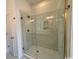 Large walk-in shower with marble tile at 493 Ayrhill Loop, Myrtle Beach, SC 29588