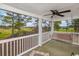 Screened-in porch offering peaceful golf course views at 5050 Windsor Green Way # 304, Myrtle Beach, SC 29579