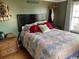 Cozy bedroom with patterned bedding and dark headboard at 546 South Eaddy Ford Rd., Johnsonville, SC 29555