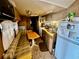 Small kitchen with refrigerator, stove and dining area at 6001 - N-57 S Kings Hwy., Myrtle Beach, SC 29575