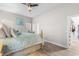 Serene bedroom with light blue bedding and walk-in closet at 6005 Mossy Oaks Dr., North Myrtle Beach, SC 29582