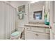 Bathroom with granite countertop and teal accents at 6061 Tramonto St., Myrtle Beach, SC 29577