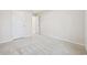 Simple bedroom with neutral carpeting and access to a bathroom at 608 Montenegro Way # E, Myrtle Beach, SC 29579