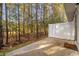 Private patio with wooded backyard views at 608 Montenegro Way # E, Myrtle Beach, SC 29579