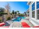 Private pool with a serene water feature and ample space for lounging at 6105 Bolsena Place, Myrtle Beach, SC 29577