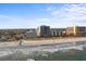 Beachfront property with hotels, sandy beach, and ocean waves at 6804 N Ocean Blvd. # 1215, Myrtle Beach, SC 29572