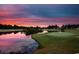 Beautiful sunset over the golf course and pond at 8121 Amalfi Pl. # 5-103, Myrtle Beach, SC 29572