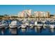 Boats docked at a marina with a large building in the background at 8121 Amalfi Pl. # 5-103, Myrtle Beach, SC 29572