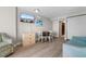 Living area with a small dining table and light wood-look flooring at 1501 S Ocean Blvd. # 1243, Myrtle Beach, SC 29577