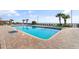 Outdoor pool with lounge chairs, palm trees, and ocean views at 1501 S Ocean Blvd. # 1243, Myrtle Beach, SC 29577