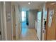 Hallway with access to the kitchen, bathroom, and living area at 2301 S Ocean Blvd. # 1002, North Myrtle Beach, SC 29582