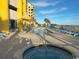 Pool and hot tub area with lounge chairs and ocean views at 2301 S Ocean Blvd. # 1002, North Myrtle Beach, SC 29582