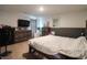 Bedroom featuring a bed, dresser, mounted TV, and a small fan at 2990 Skylar Dr., Myrtle Beach, SC 29577