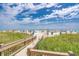 Wooden walkway leading to beach at 308 Golan Circle # C, Myrtle Beach, SC 29579