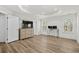 Spacious bedroom with wood-look floors, dresser, workspace, and lots of natural light at 308 Golan Circle # C, Myrtle Beach, SC 29579