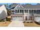 Charming two-story townhome with a one-car garage and landscaped front yard at 308 Golan Circle # C, Myrtle Beach, SC 29579