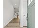 Inviting foyer with wood-look flooring and a view of the staircase at 308 Golan Circle # C, Myrtle Beach, SC 29579