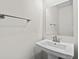 Half bathroom with pedestal sink and modern fixtures at 308 Golan Circle # C, Myrtle Beach, SC 29579