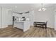 Bright, modern kitchen with white cabinets, stainless steel appliances, and a large island at 308 Golan Circle # C, Myrtle Beach, SC 29579