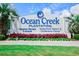 Ocean Creek Plantation sign welcomes visitors to this oceanfront resort at 415 Ocean Creek Dr. # 2373, Myrtle Beach, SC 29572