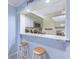 Compact kitchen with granite countertop and bar seating at 415 Ocean Creek Dr. # 2373, Myrtle Beach, SC 29572
