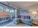 Living area with balcony access and comfortable furniture at 415 Ocean Creek Dr. # 2373, Myrtle Beach, SC 29572
