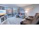 Coastal-themed living room with comfy seating and balcony access at 415 Ocean Creek Dr. # 2373, Myrtle Beach, SC 29572