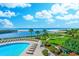 Ocean Creek Plantation pool area with lounge chairs overlooking the beach and inlet at 415 Ocean Creek Dr. # 2373, Myrtle Beach, SC 29572