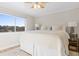 Bright and airy main bedroom with large windows showcasing scenic views at 4445 Kingsport Rd. # 303, Little River, SC 29566