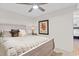 Cozy guest bedroom with wooden headboard and coastal decor at 4445 Kingsport Rd. # 303, Little River, SC 29566