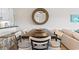 Dining area with large wooden table and seating for six at 4445 Kingsport Rd. # 303, Little River, SC 29566