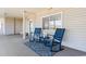 Relaxing front porch with comfortable seating and a coastal vibe at 4445 Kingsport Rd. # 303, Little River, SC 29566